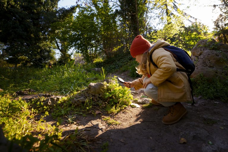full-shot-girl-exploring-nature